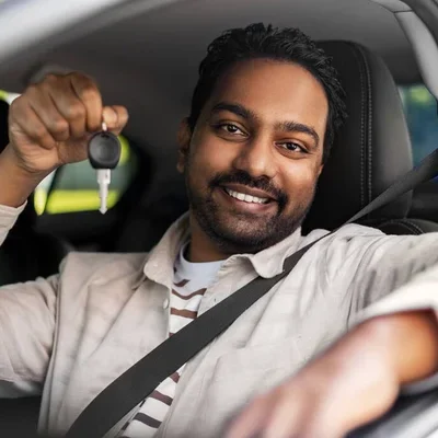 depositphotos_488859088-stock-photo-smiling-indian-man-or-driver